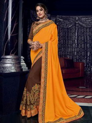 Оранжевое и коричневое шёлковое индийское сари, украшенное вышивкой люрексом, скрученной шёлковой нитью со стразами
