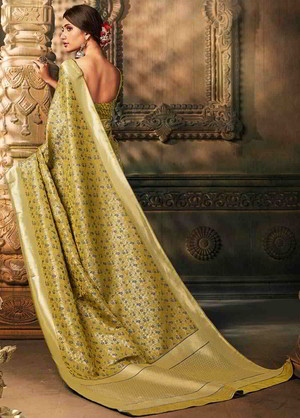 Лимонно-жёлтое шёлковое индийское сари, украшенное вышивкой люрексом