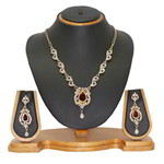 Позолоченное индийское колье с прозрачными и бордовыми стразами + серьги