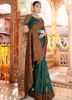 Зелёное парчёвое и шёлковое индийское сари, украшенное вышивкой люрексом
