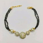 *Чёрный, золотой и серый индийский браслет с перламутровыми бусинками