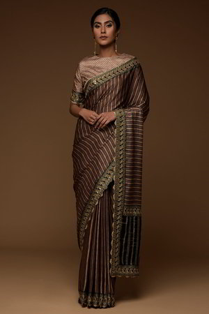 Коричневое, чёрное и золотое индийское сари из шёлка, украшенное вышивкой